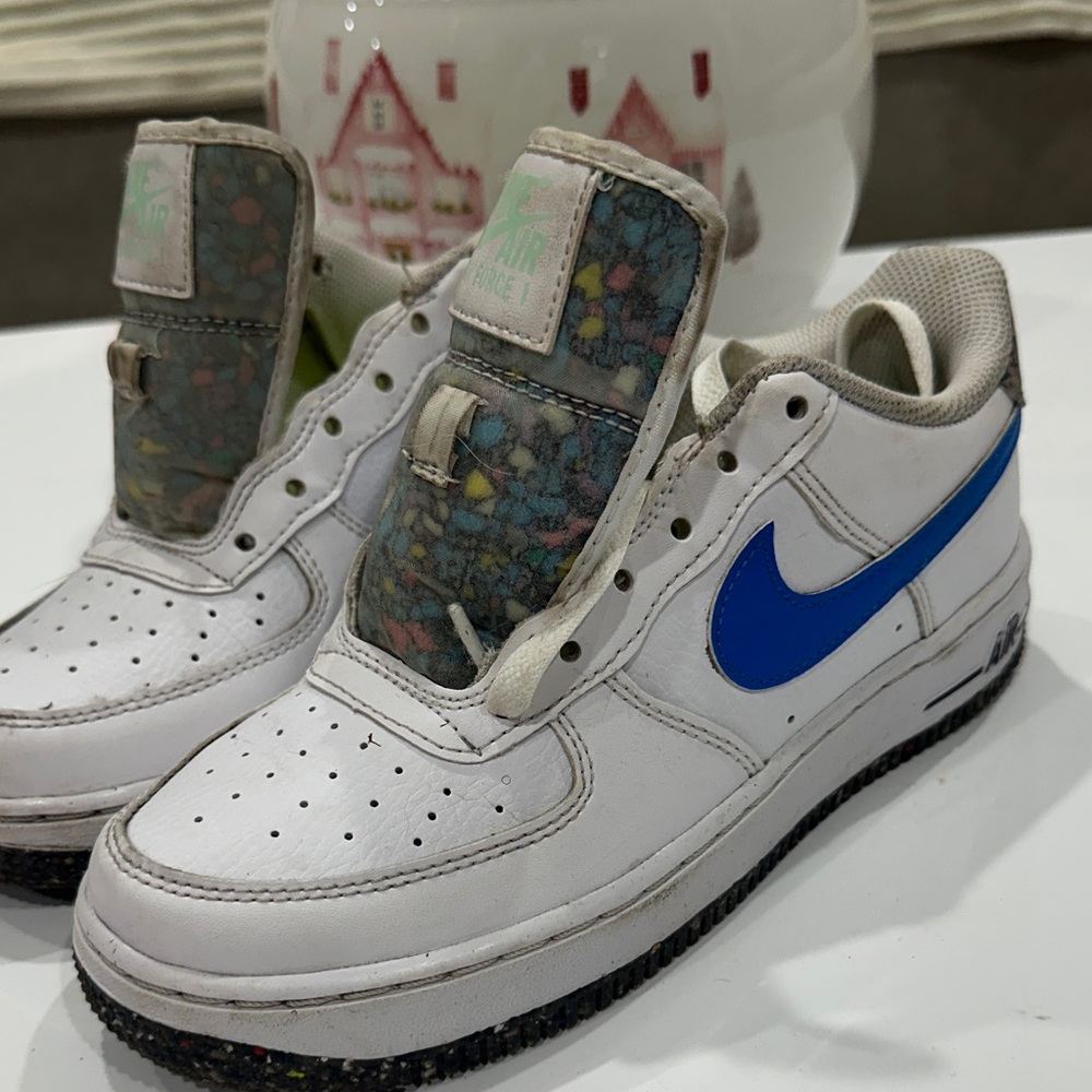 Nike White Sneakers with Blue Swoosh and Multicolor Tongue